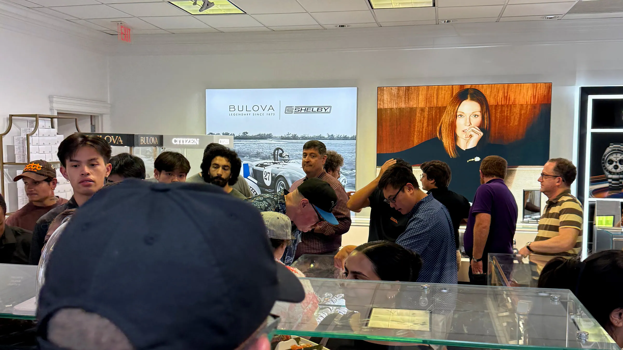 Guests crowded around the Temaki Live counter inside the Murad & Co showroom in Tysons